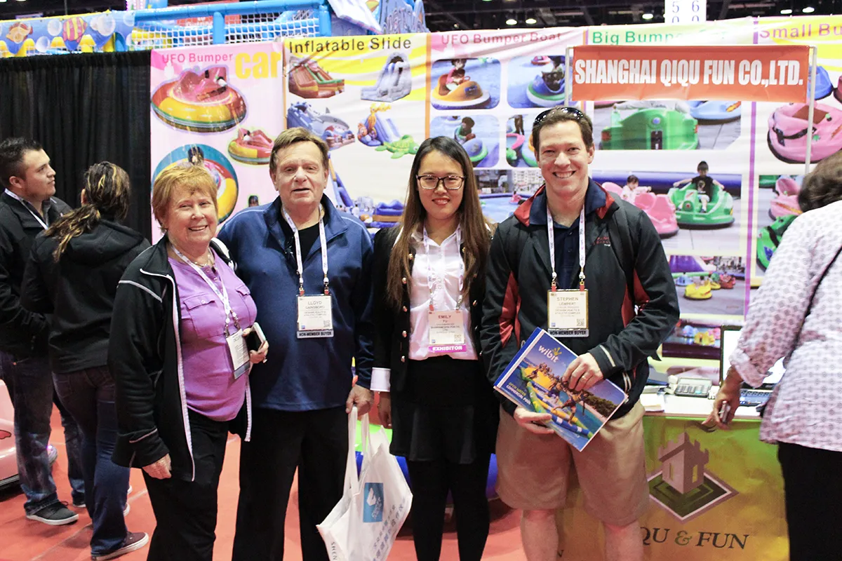 The genesis of a decade-long legacy: Shanghai Qiqu Fun Founder Emily with early North American buyers at our inaugural IAAPA Orlando exhibition in 2014