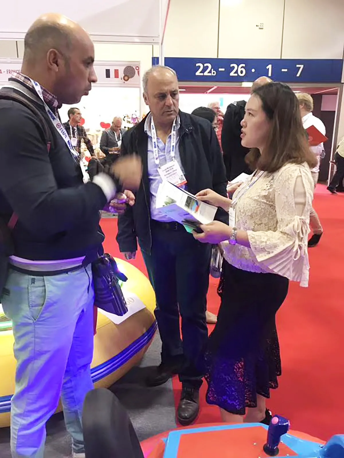 Shanghai Qiqu Fun Founder Emily negotiating rigorous technical specifications for commercial bumper cars with European operators at IAAPA Expo Germany 2017