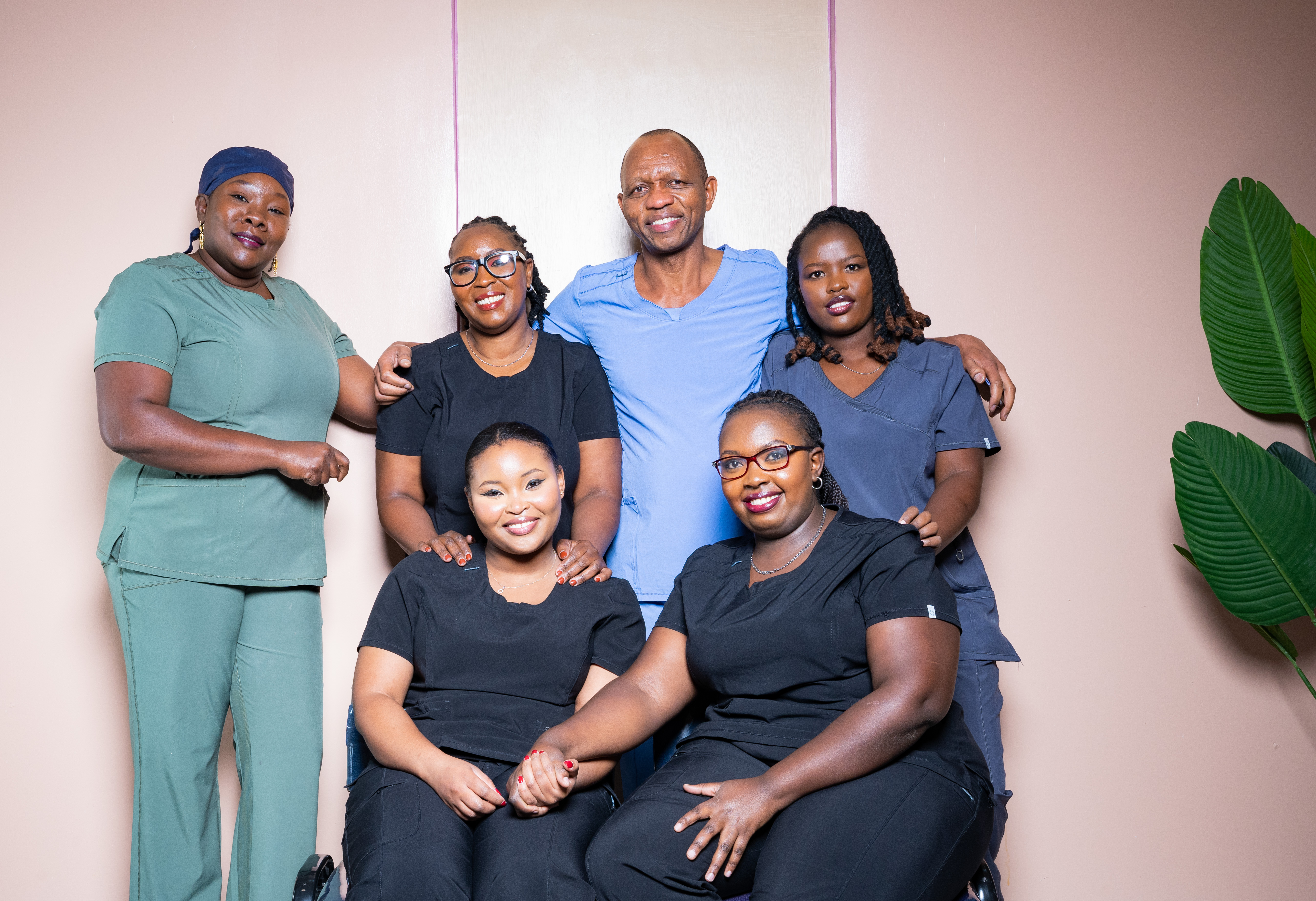 Happy Kenyan family at dental clinic