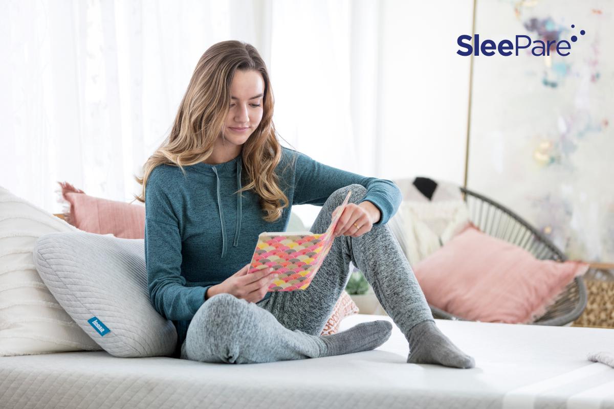Leesa Mattress Girl sitting on Leesa mattress