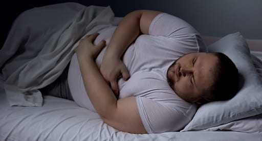 Increased reflux is seen in people who sleep on right side