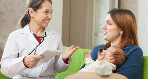 A consultant counseling a lady at Parenting Made Joyful