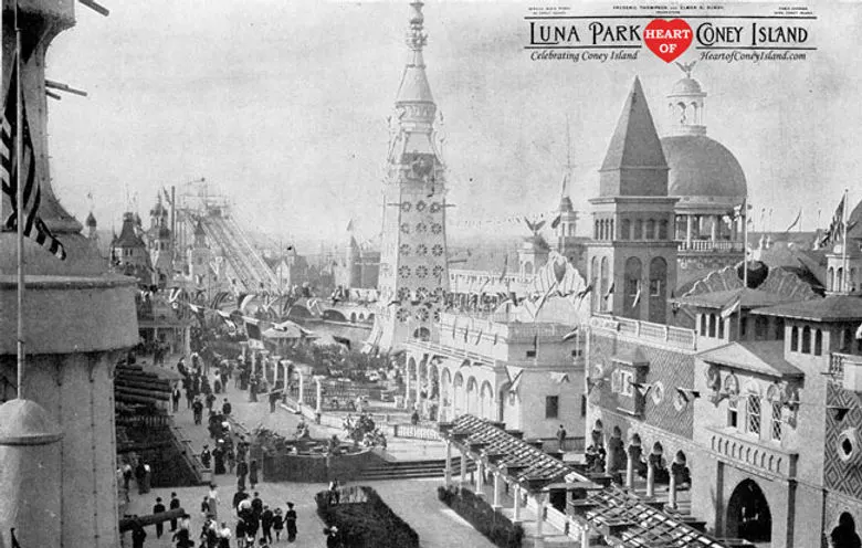 Vintage photo of Luna Park, Coney Island, shows large crowds and elaborate architecture with towers.