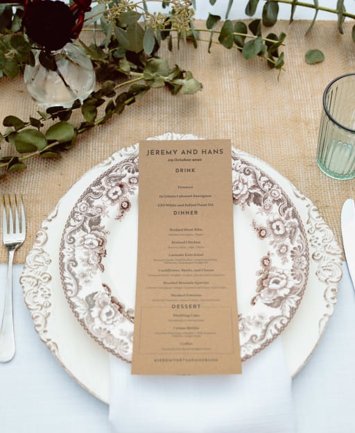 Tight shot of menu on a place setting.