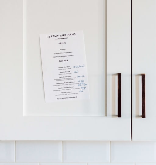Our dinner menu, pinned to a kitchen cabinet door.
