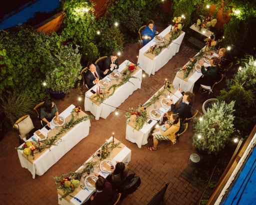 A view from above of the reception with everyone seated.