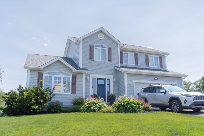 Cyr St home in Dieppe before new siding