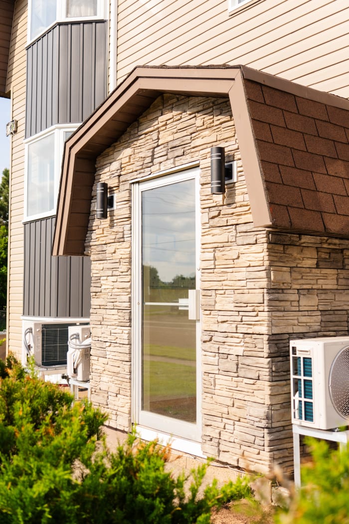 Stone-clad exterior entrance on a Moncton home