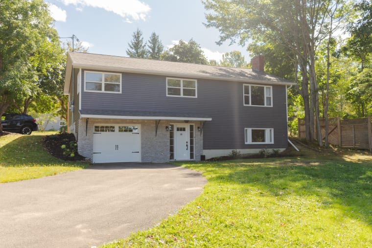 Finished home with new siding by Maritime Stone & Decor