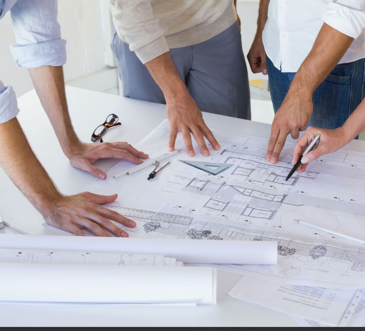 Architect reviewing smart home plans