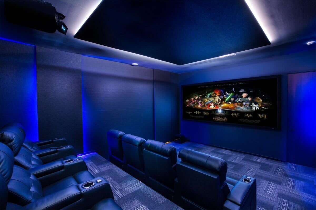 Luxury media room with blue lighting