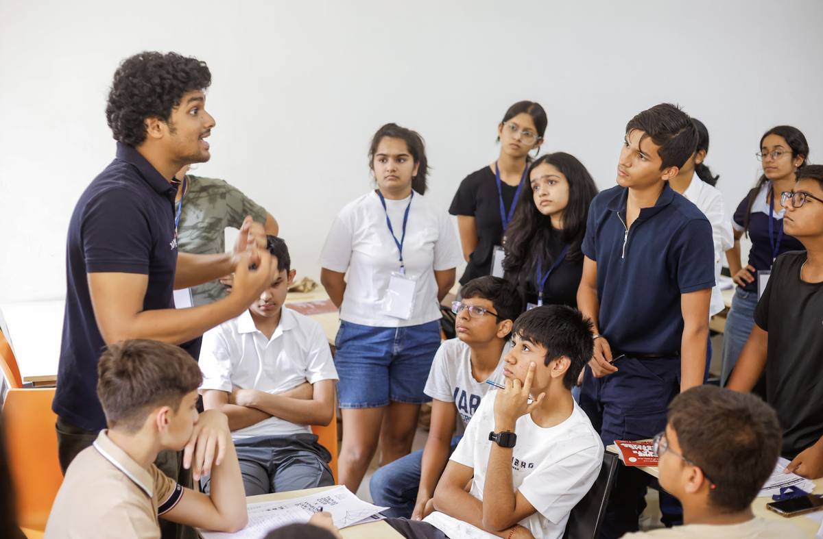 Trainer engaging with student group
