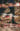 The image captures a person walking through a natural setting with overlaid eyes and the text "Blood Red Wine". The artwork evokes a sense of introspection and human presence in nature. blurred out low res
