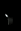 A close-up photograph showcasing a silver object with a mesh band, set against a stark black background. blurred out low res
