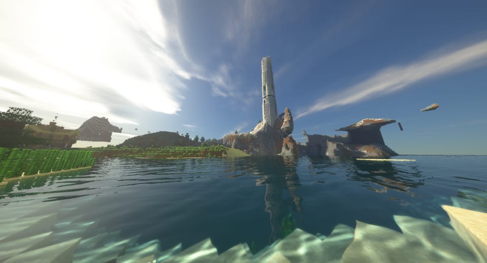 A pixelated landscape with a tall tower and floating structures. The scene is reflected in the clear water.