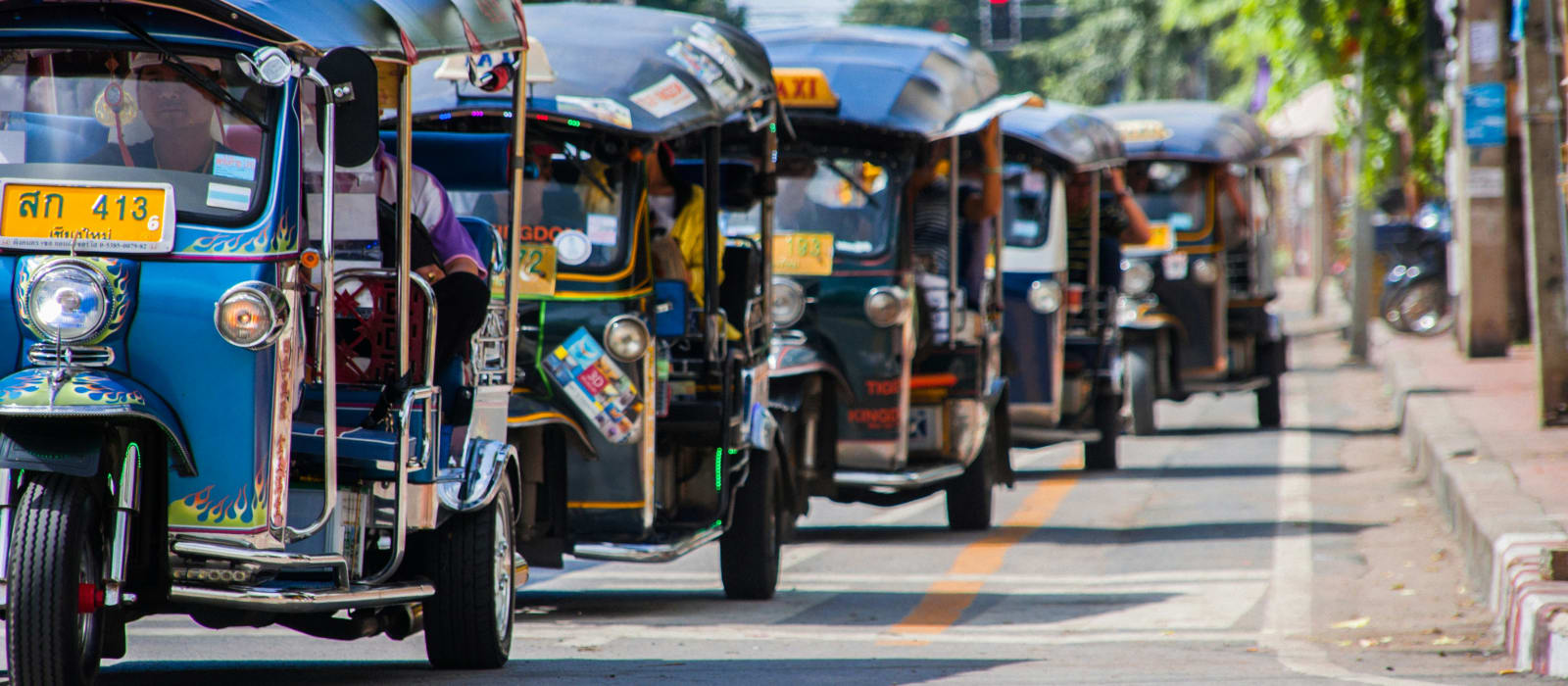 Tuk-Tuks, Taxis, and Songthaews: Getting Around Thai Towns