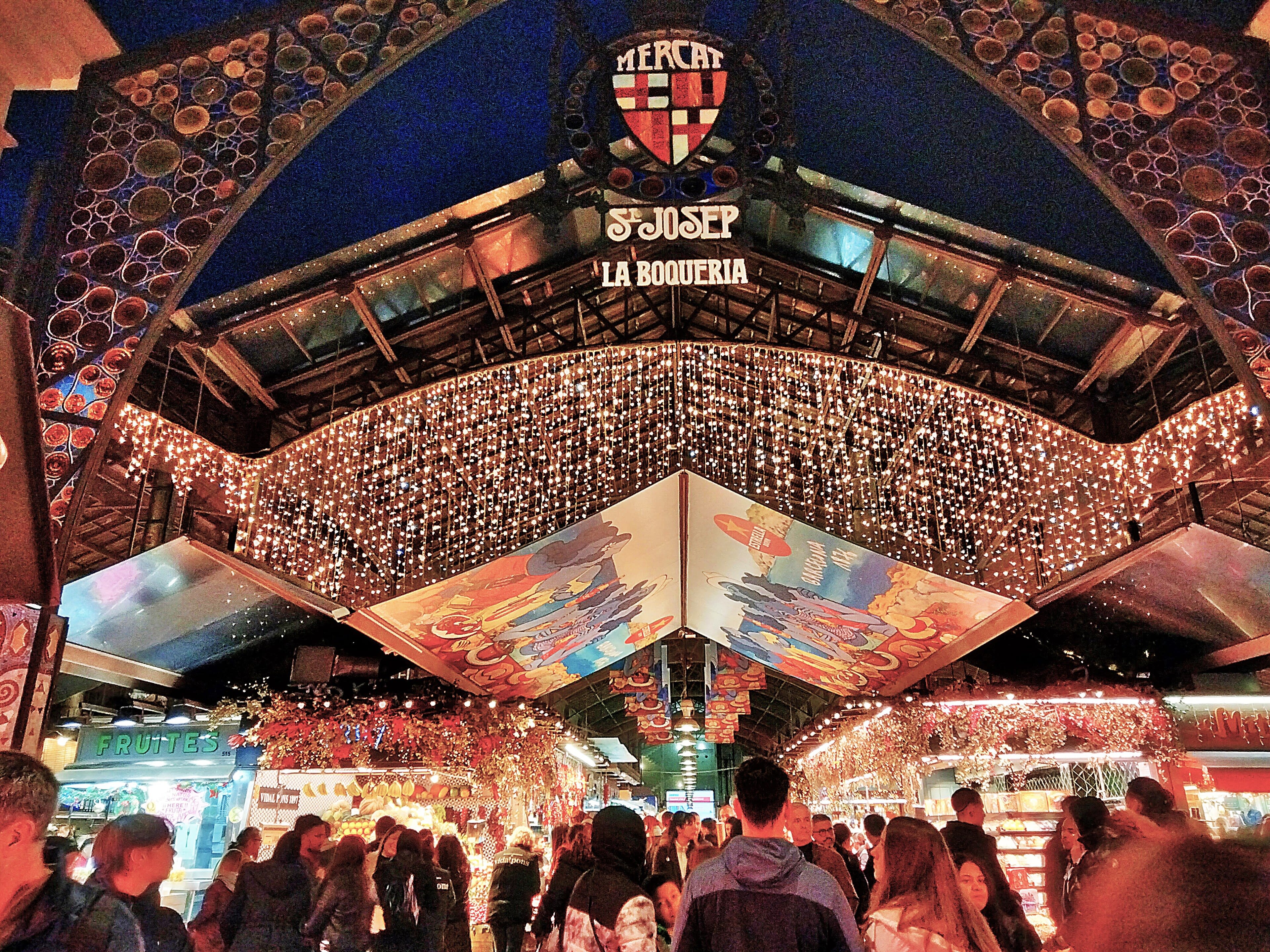 A free experience — a city beach, Ciutadella park greenery, or a market's colorful stalls