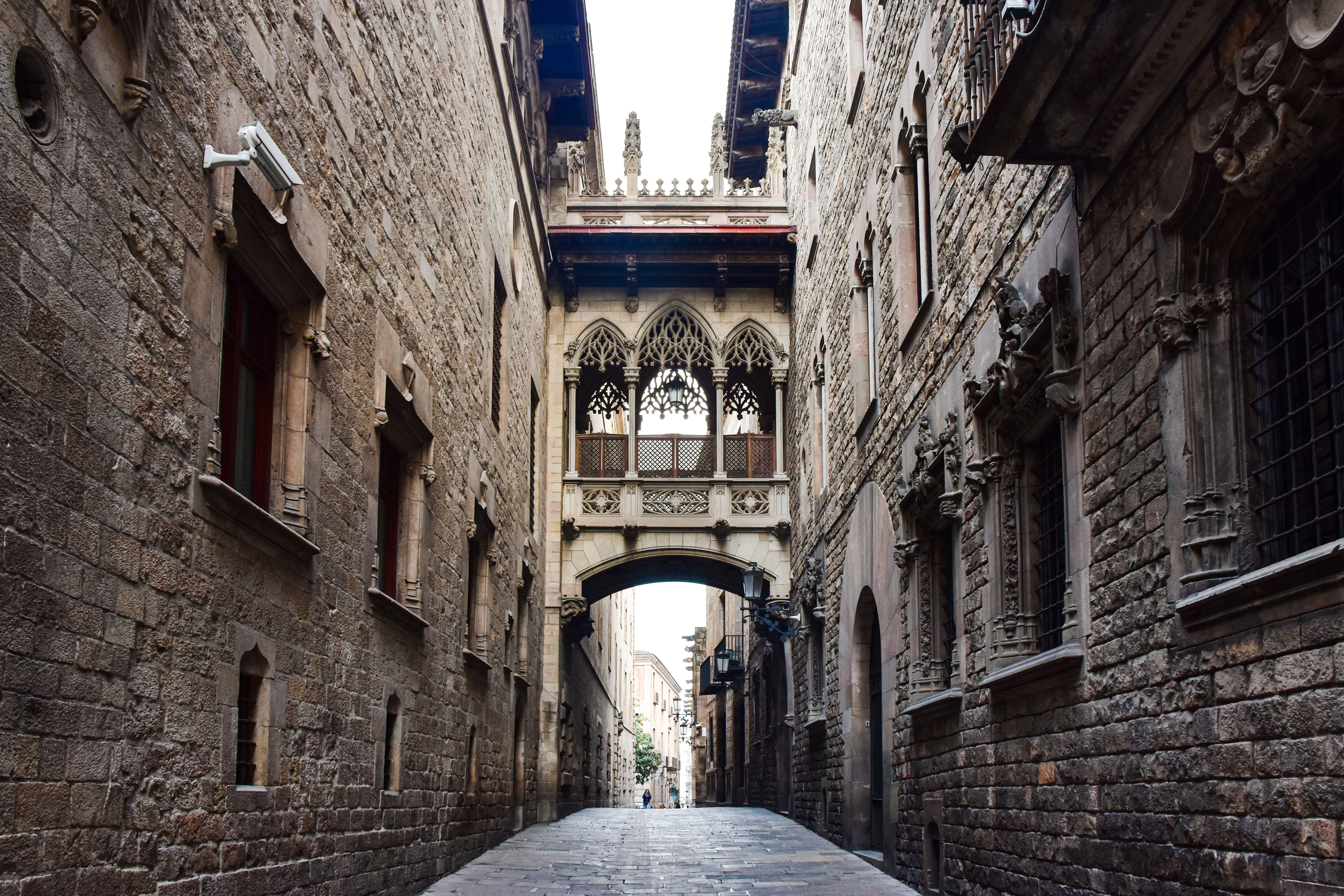 Barcelona Cathedral facade or the Pont del Bisbe neo-Gothic bridge