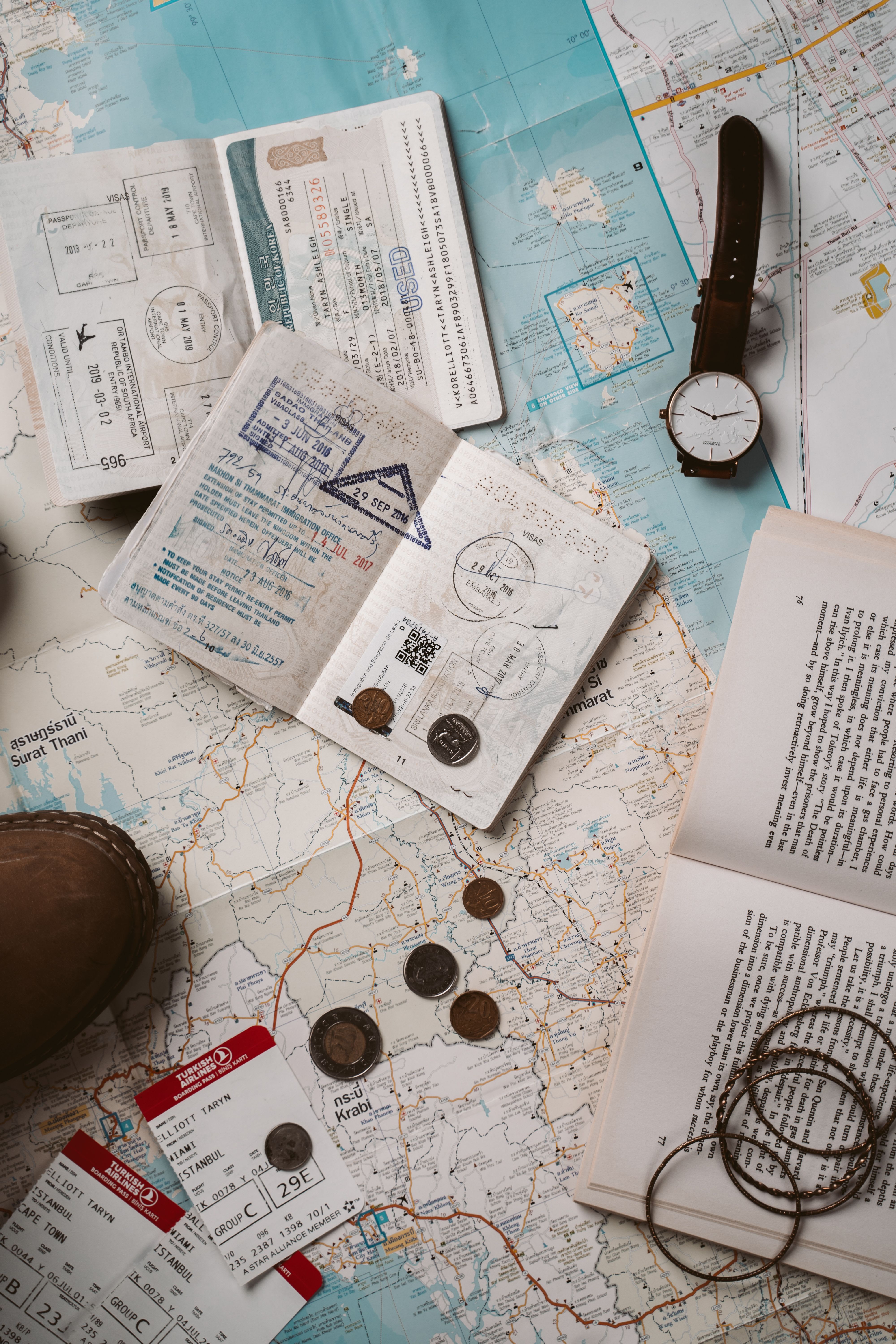 A US passport and travel documents laid out, ready for a trip