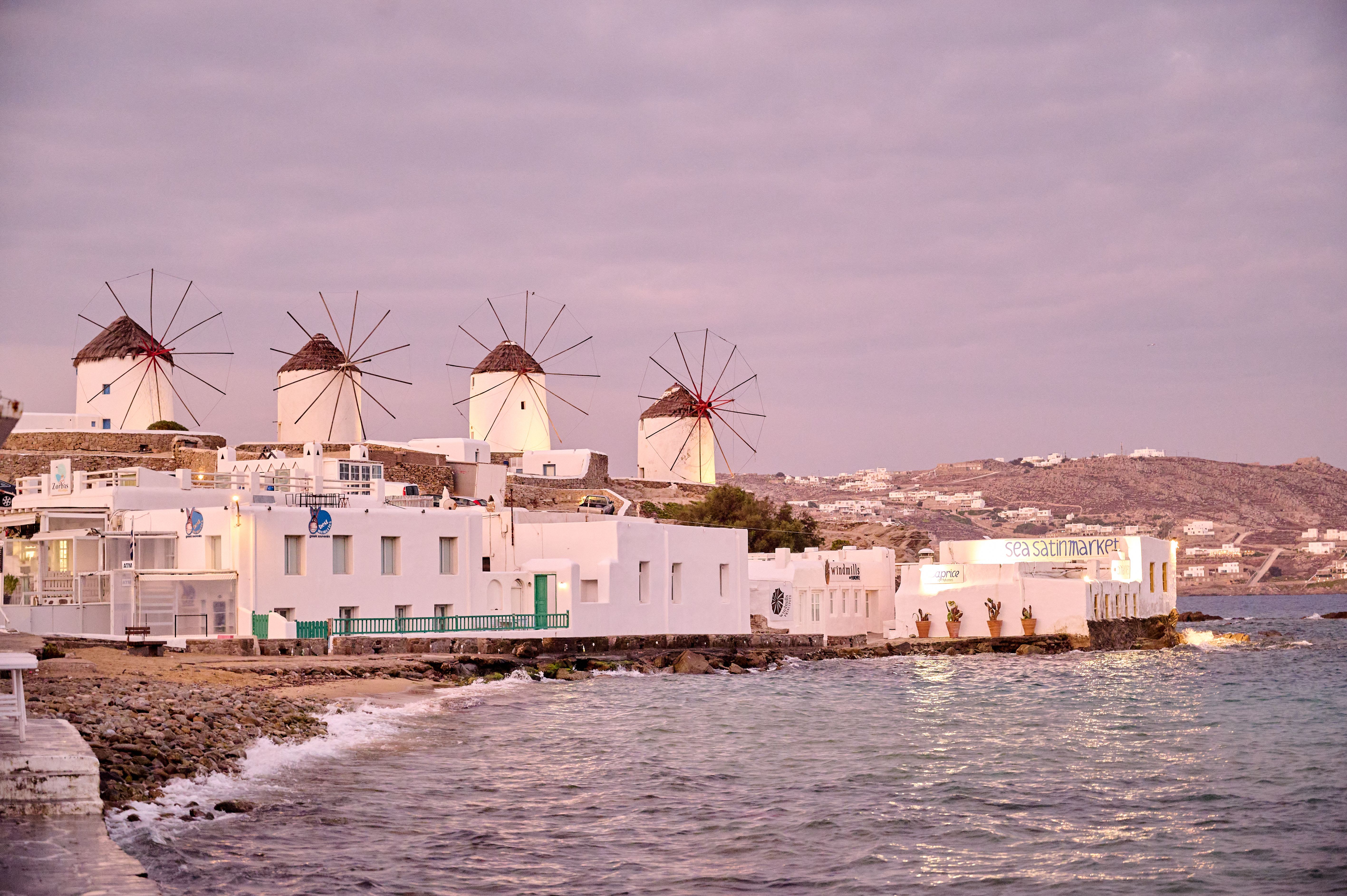 Mykonos Town whitewashed lanes and Little Venice waterfront at golden hour