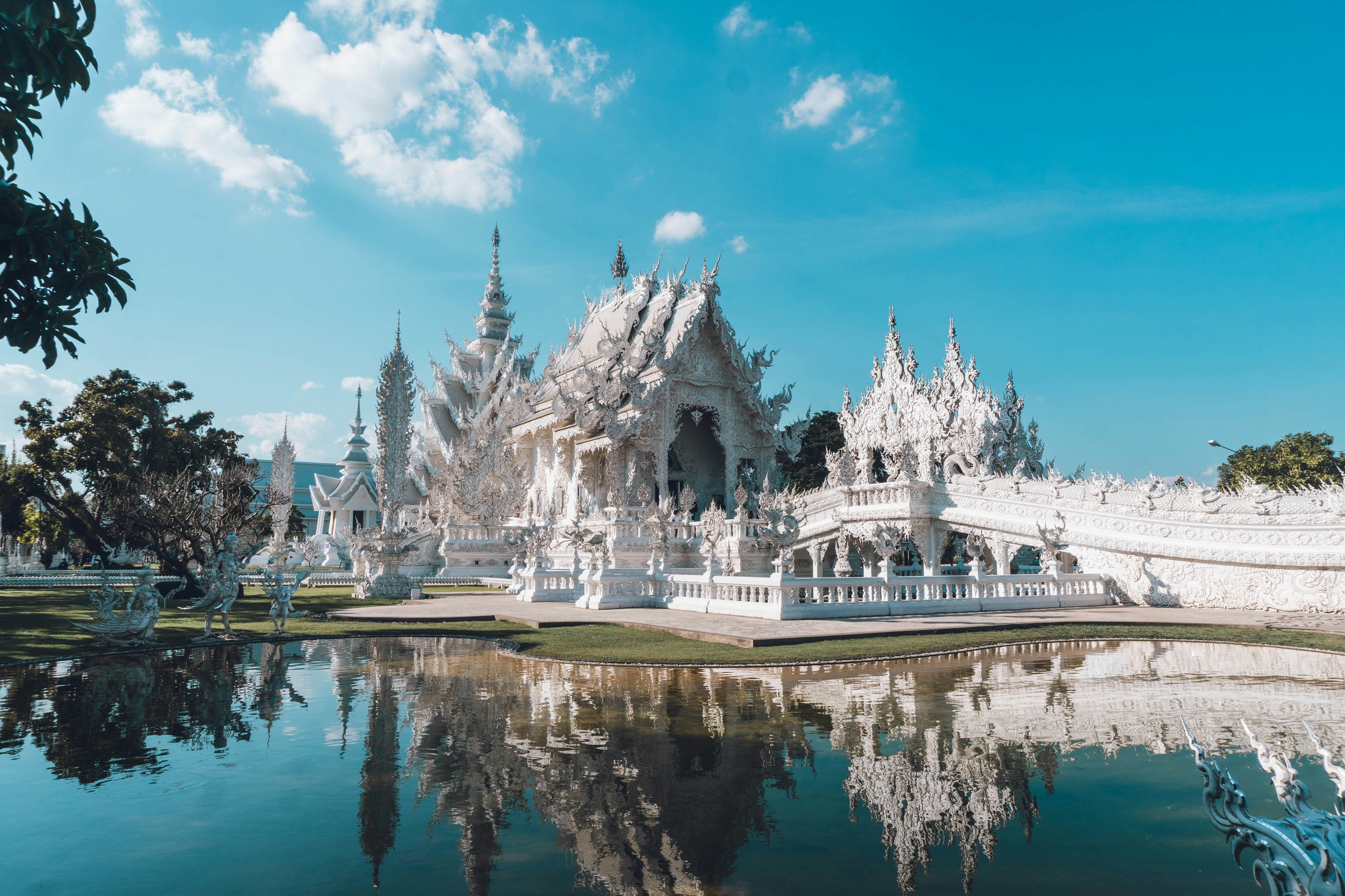 Chiang Rai's White Temple, or a misty northern mountain scene