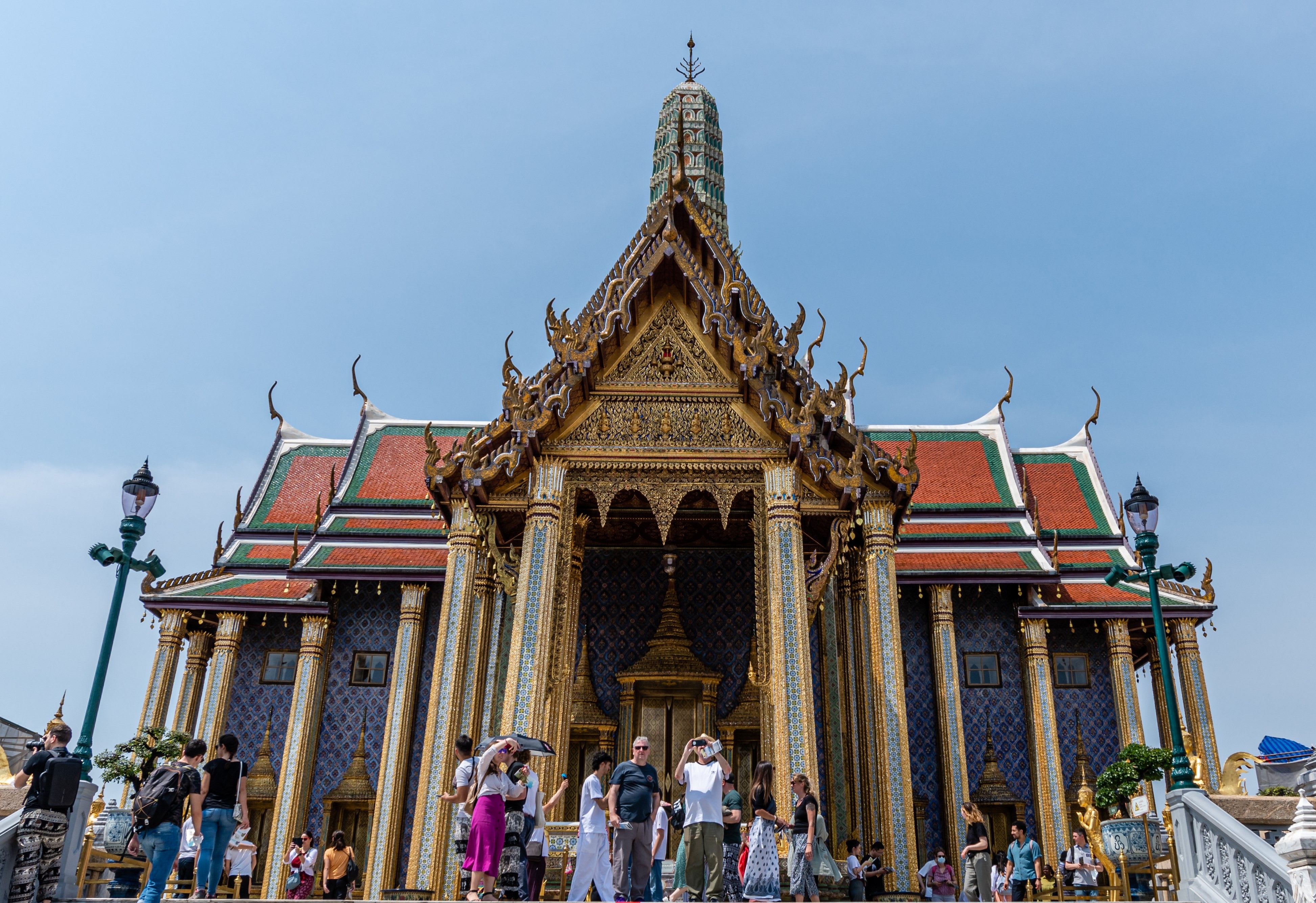 Visitors appropriately dressed at a Thai temple
