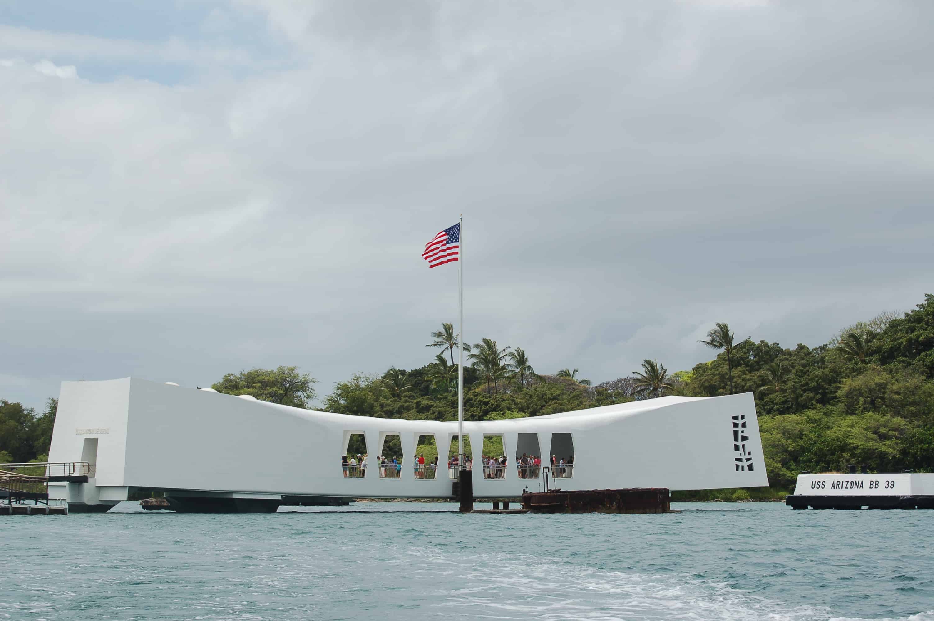 The USS Arizona Memorial above the sunken battleship in Pearl Harbor