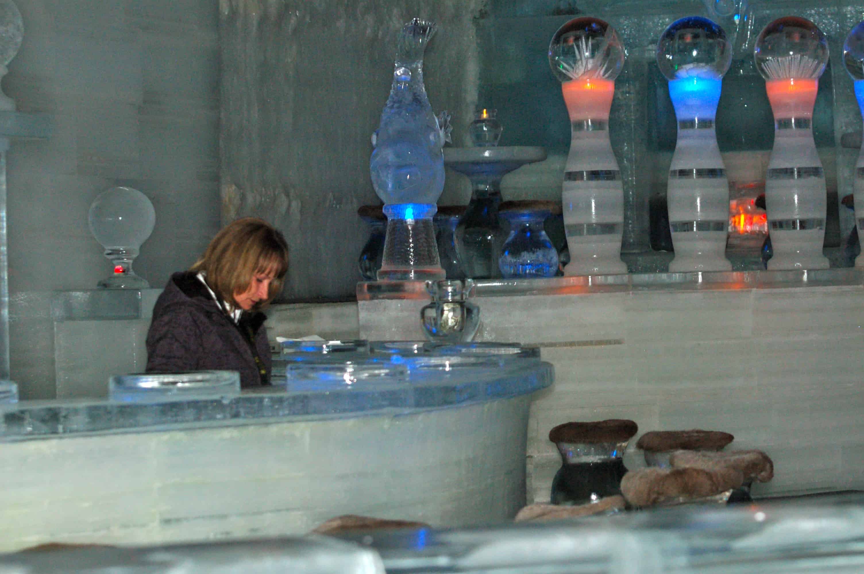 The ice bar at the Aurora Ice Museum, with lights set inside the ice