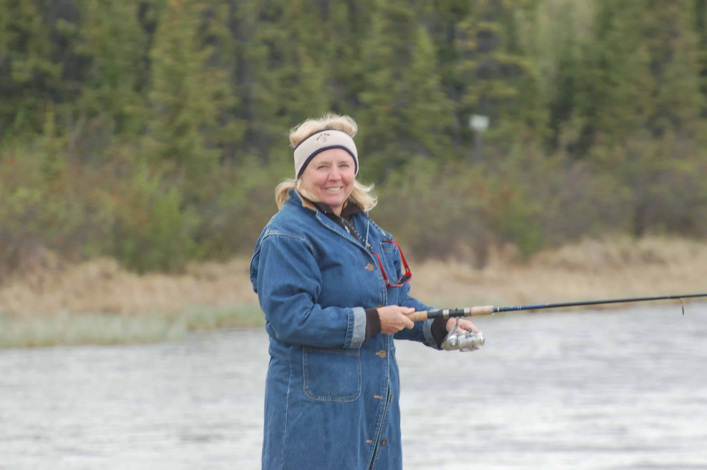Janice fishing at Lake Louise