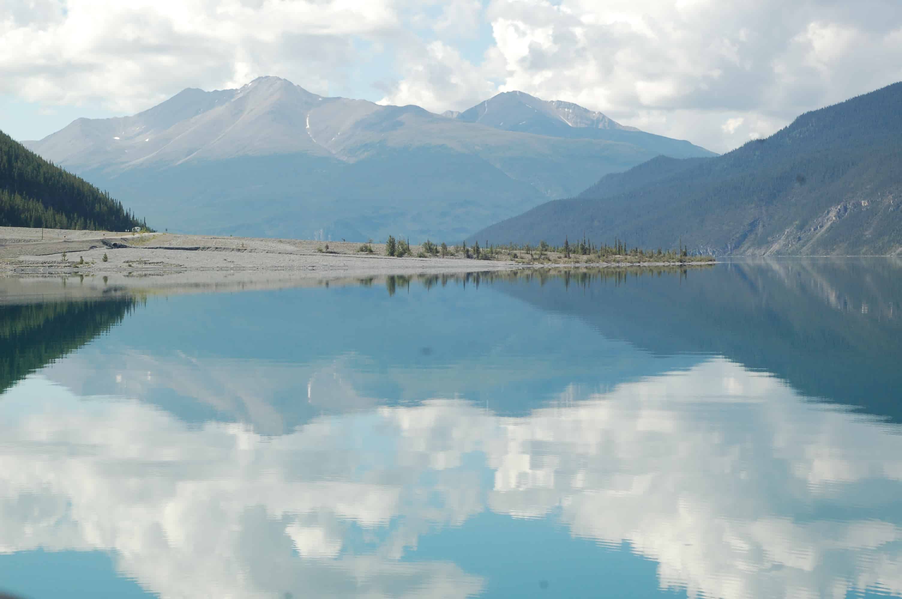 Reflections on Muncho Lake along the ALCAN