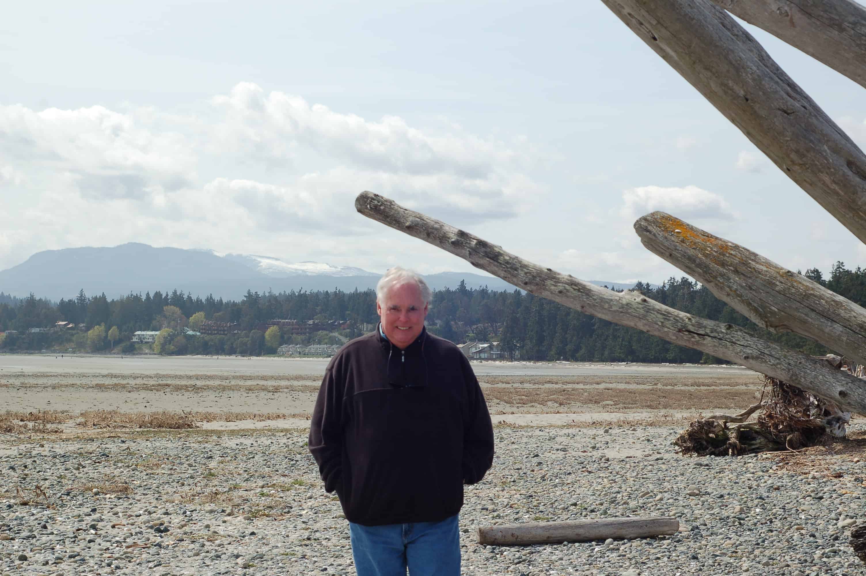 John walking the beach at Parksville
