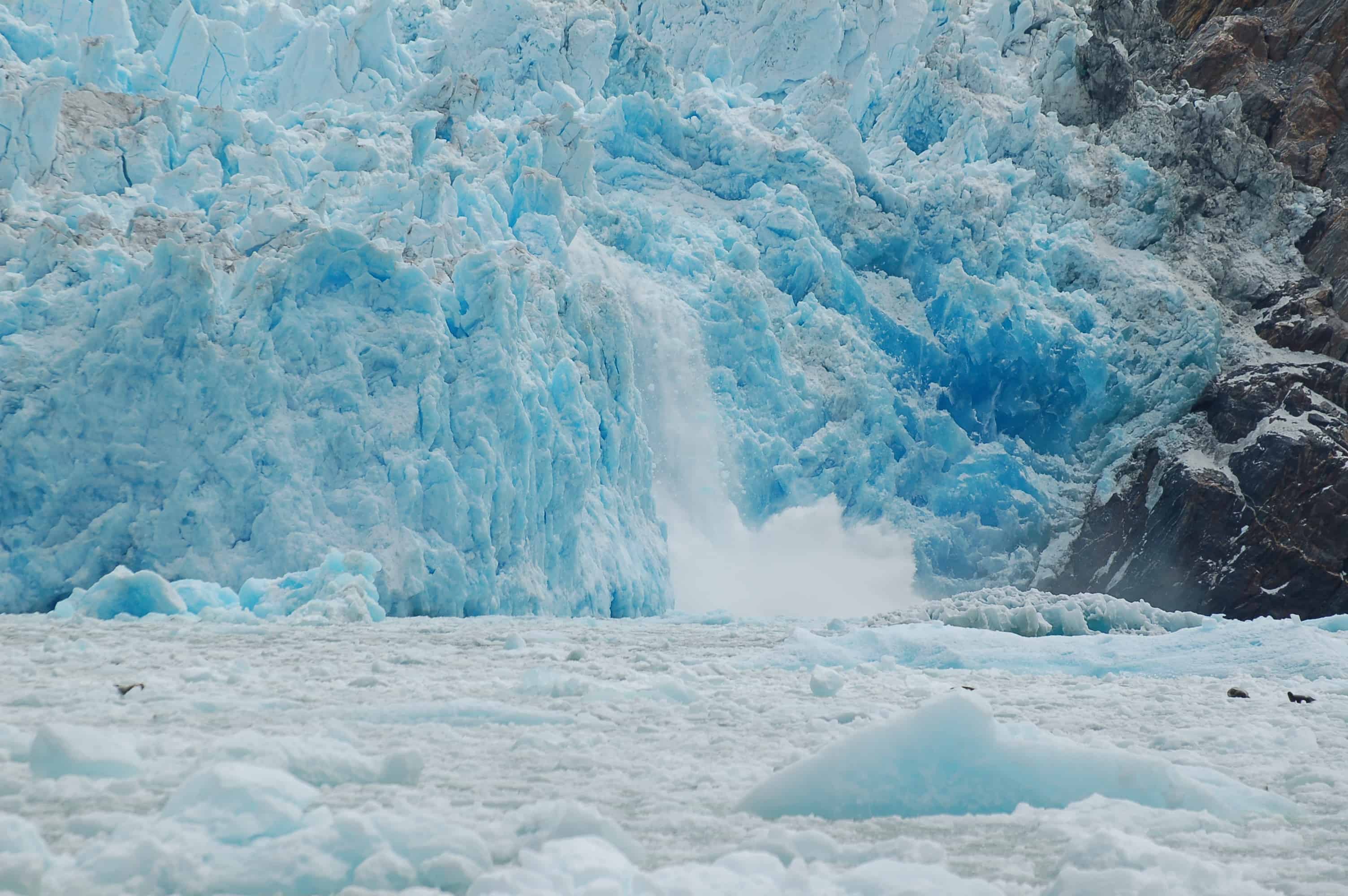 A piece of Sawyer Glacier breaking off