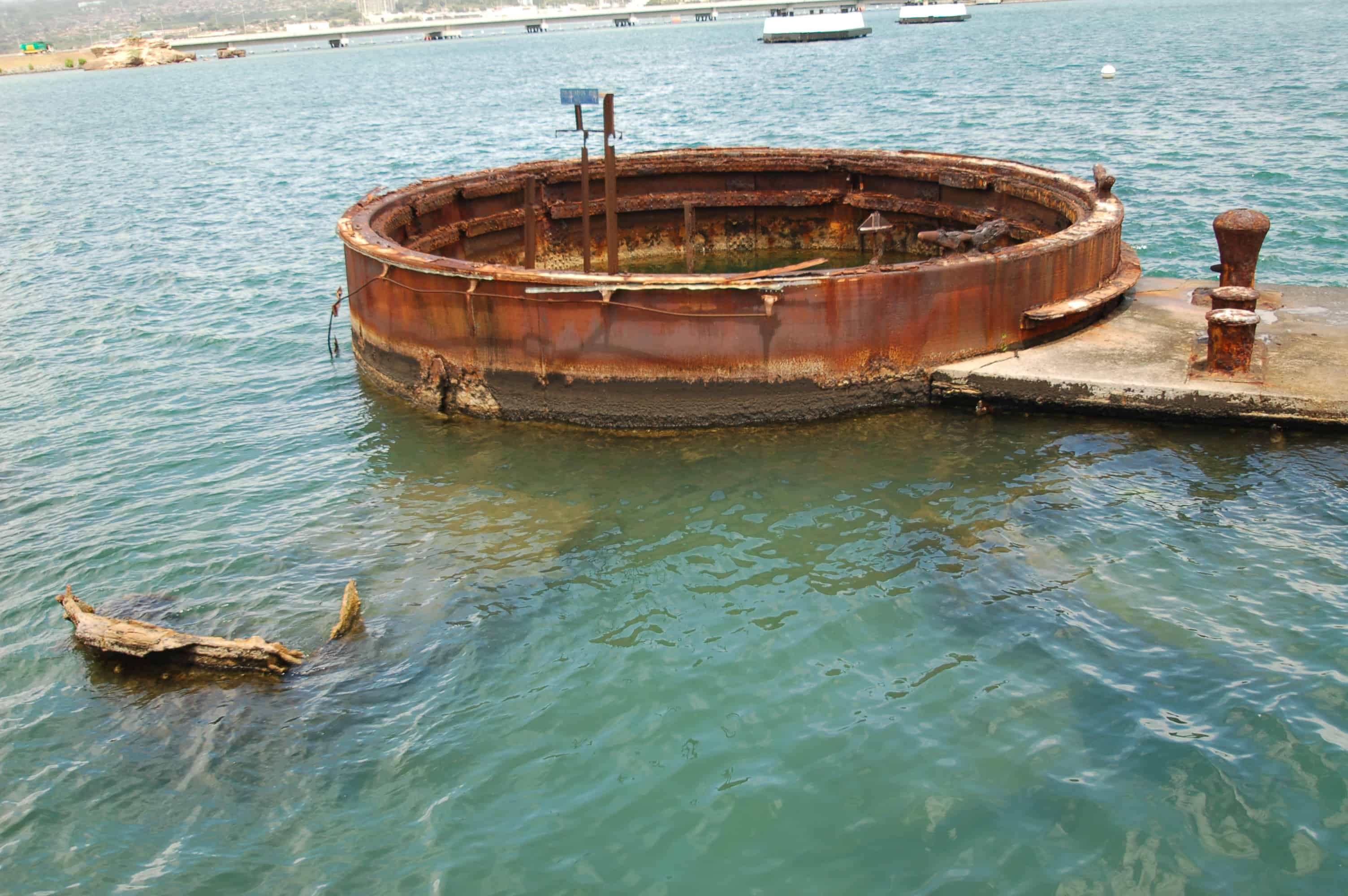 The Arizona's deck visible through the water below the memorial