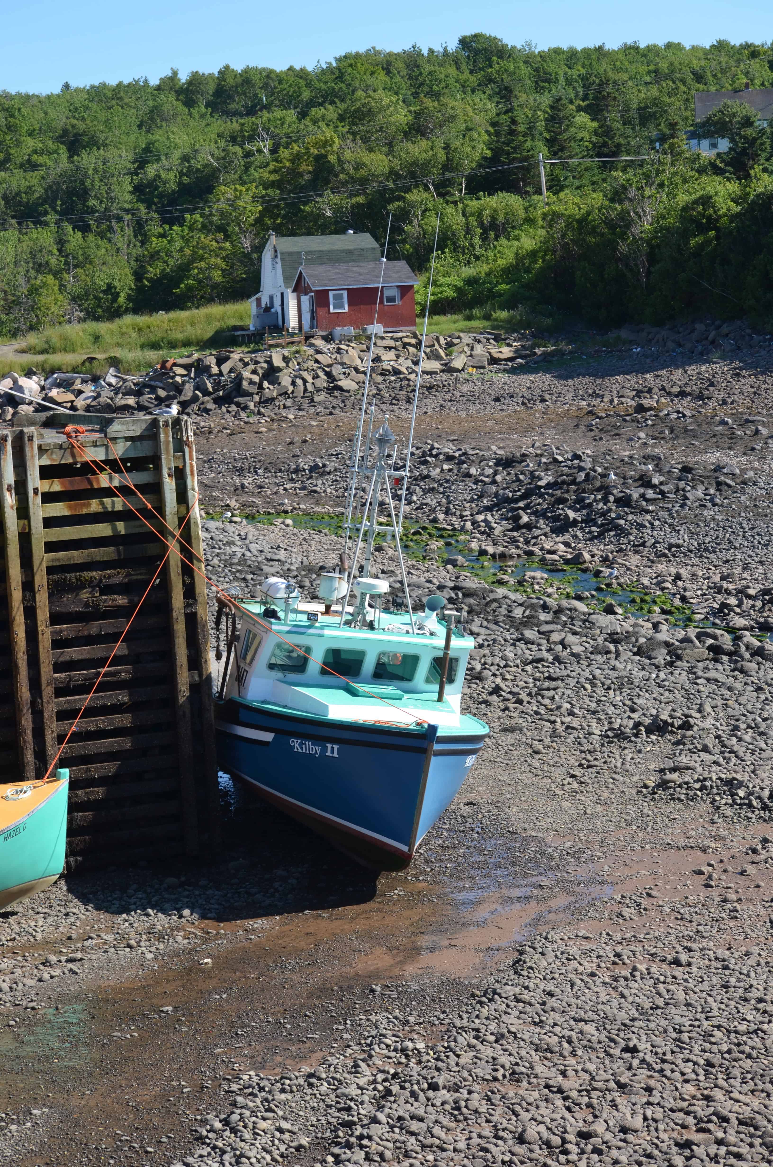 A boat aground at low tide