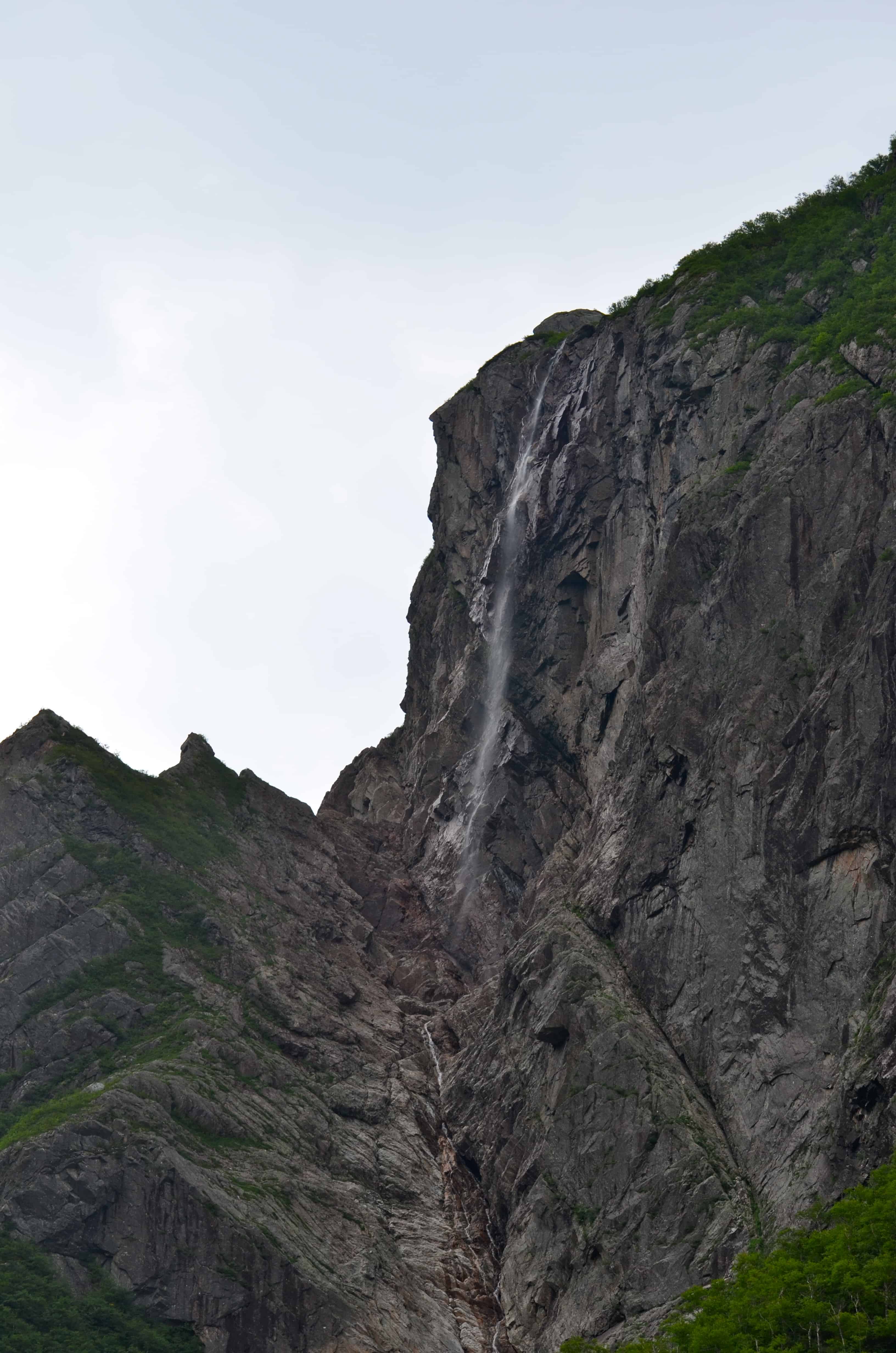 A waterfall above Western Brook Pond