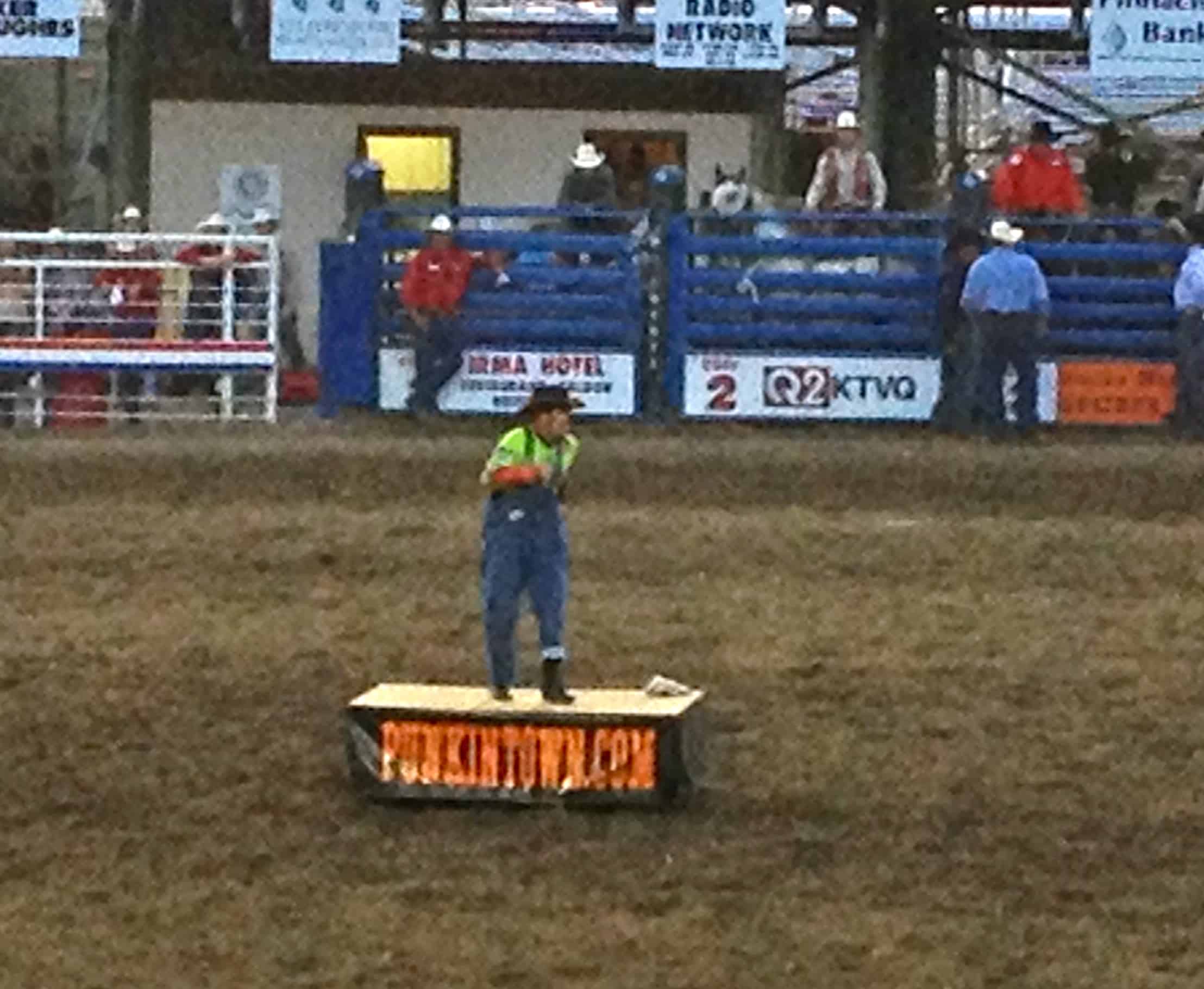 A rodeo clown at work