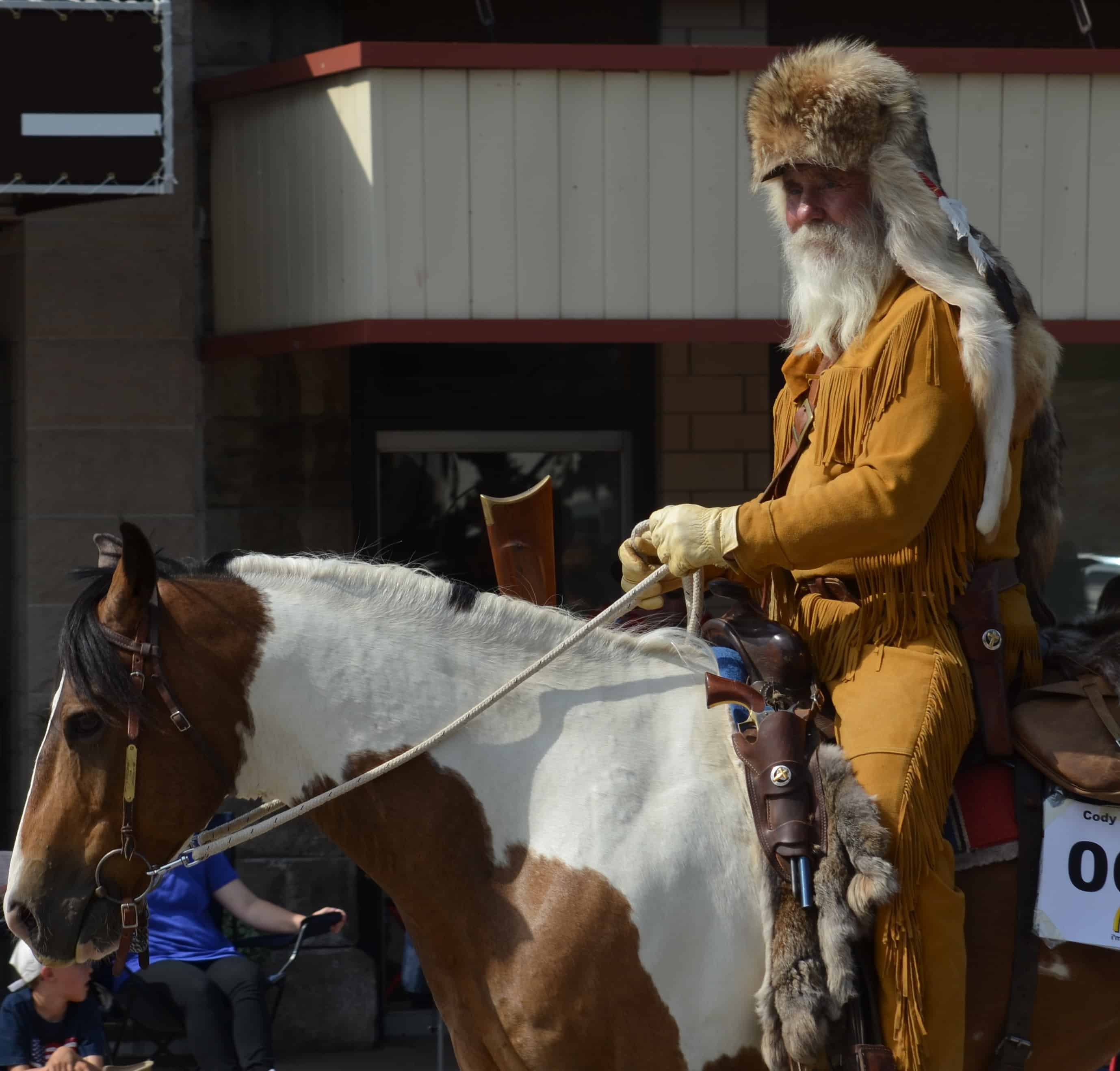 A wilderness man on horseback