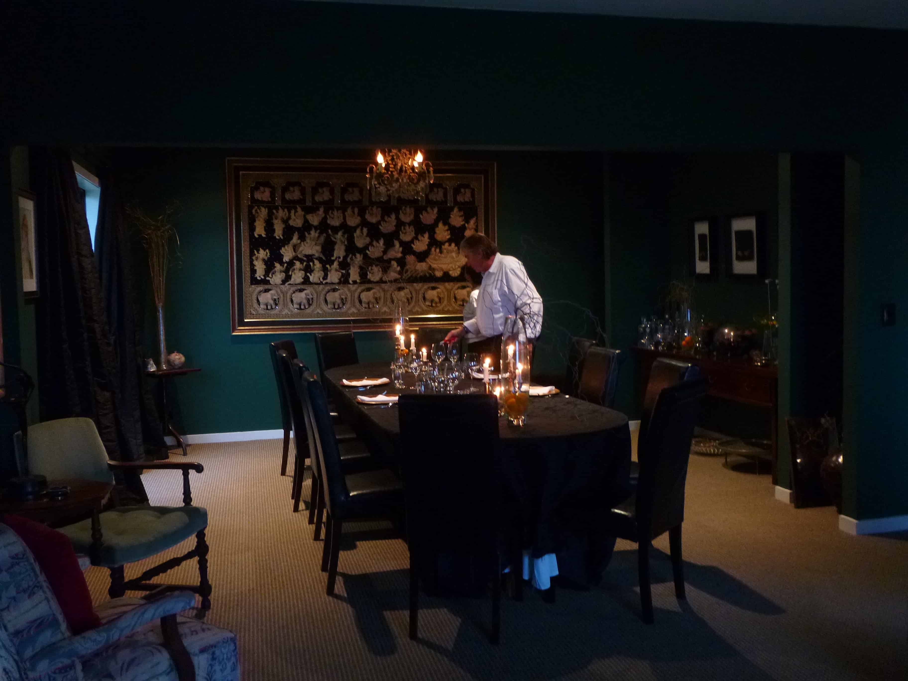 The dinner table set at the main house