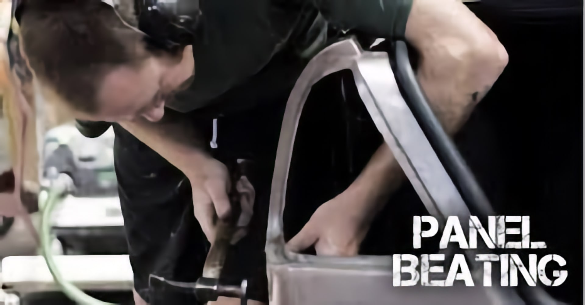 The mystery word: a "panel beater" at work