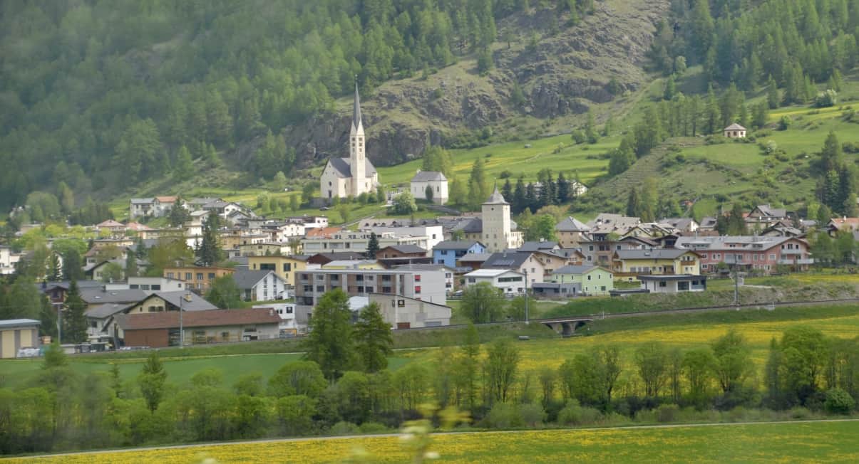 A mountain town seen from the Bernina Express