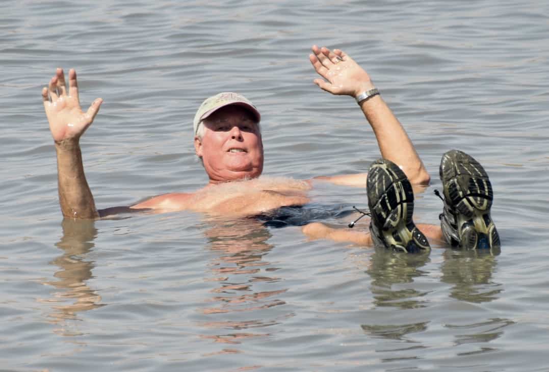 John floating in the Dead Sea