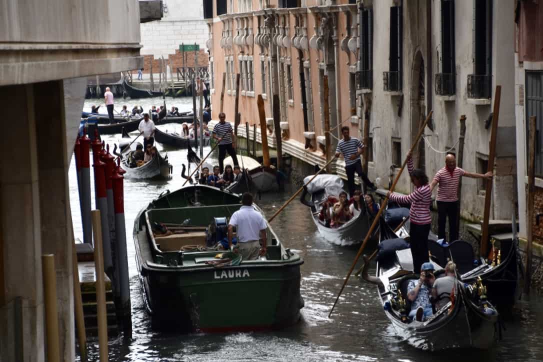 Gondolas backed up in a narrow canal