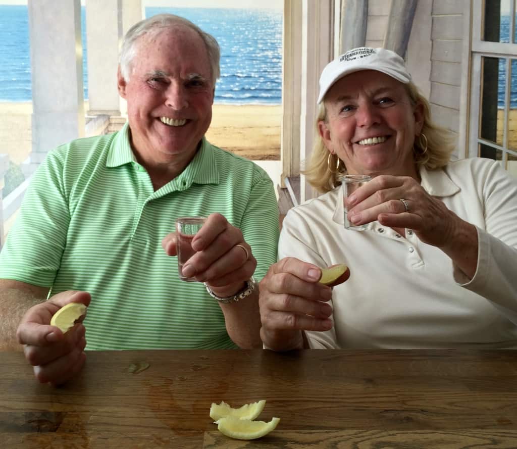 John and Janice with shots of freezer vodka in Krakow