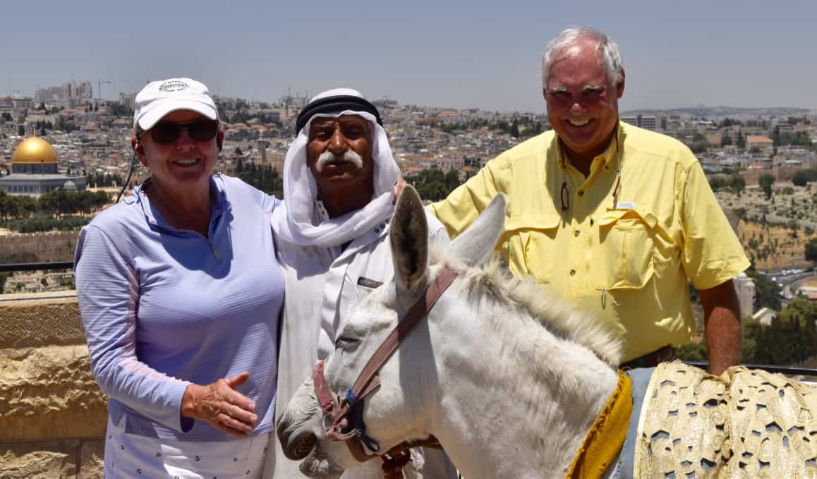 An old man and his donkey on the Mount of Olives