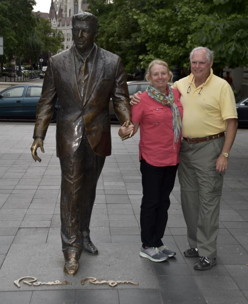 Janice and John with the statue of Ronald Reagan in Liberty Square