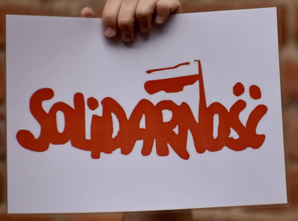 Demonstrators with Solidarity signs in Warsaw