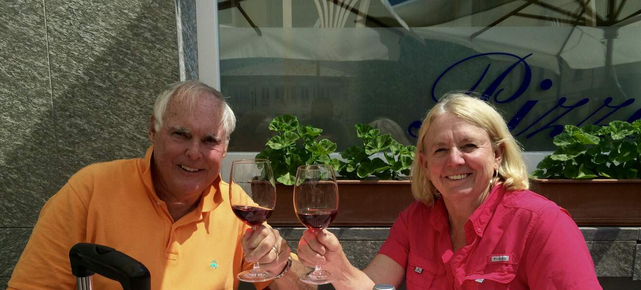 Calzone and local wine in Tirano, welcome to Italy