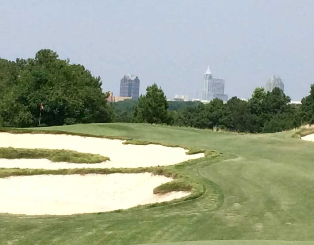 Lonnie Poole, with Raleigh in the distance