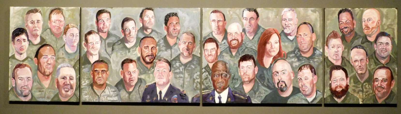 The Portraits of Courage mural on display