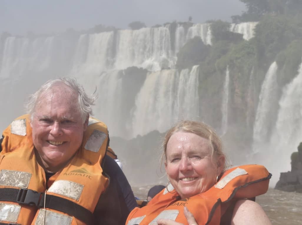 On the boat beneath the falls